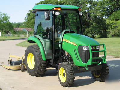 2009 john deere 3520 w/cab and land pride 72